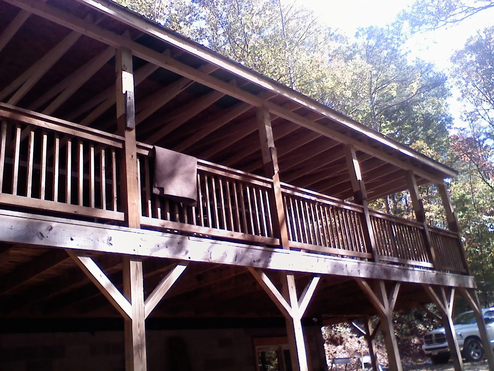 Timber framing under a new elevated porch and deck — Roof Leak Repair in Palisades Park by Roofing Brothers